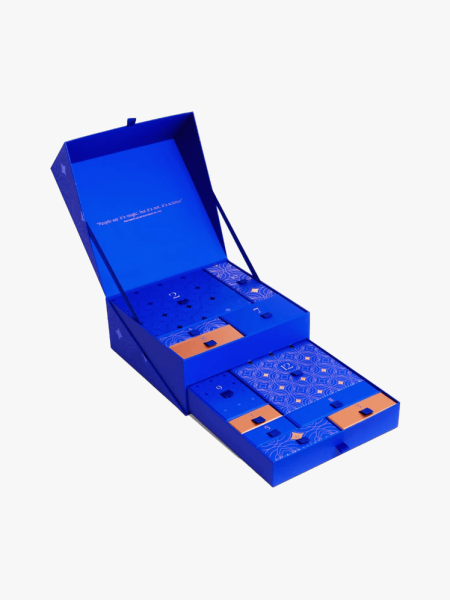 Augustinus Bader The 12 Days of Bader in branded chest with multiple components on a light gray background