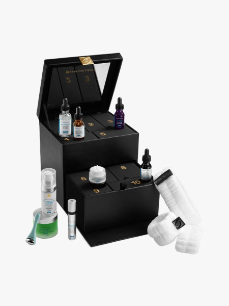 SkinCeuticals Holiday Skincare Advent Calendar in multiple branded components on a light gray background